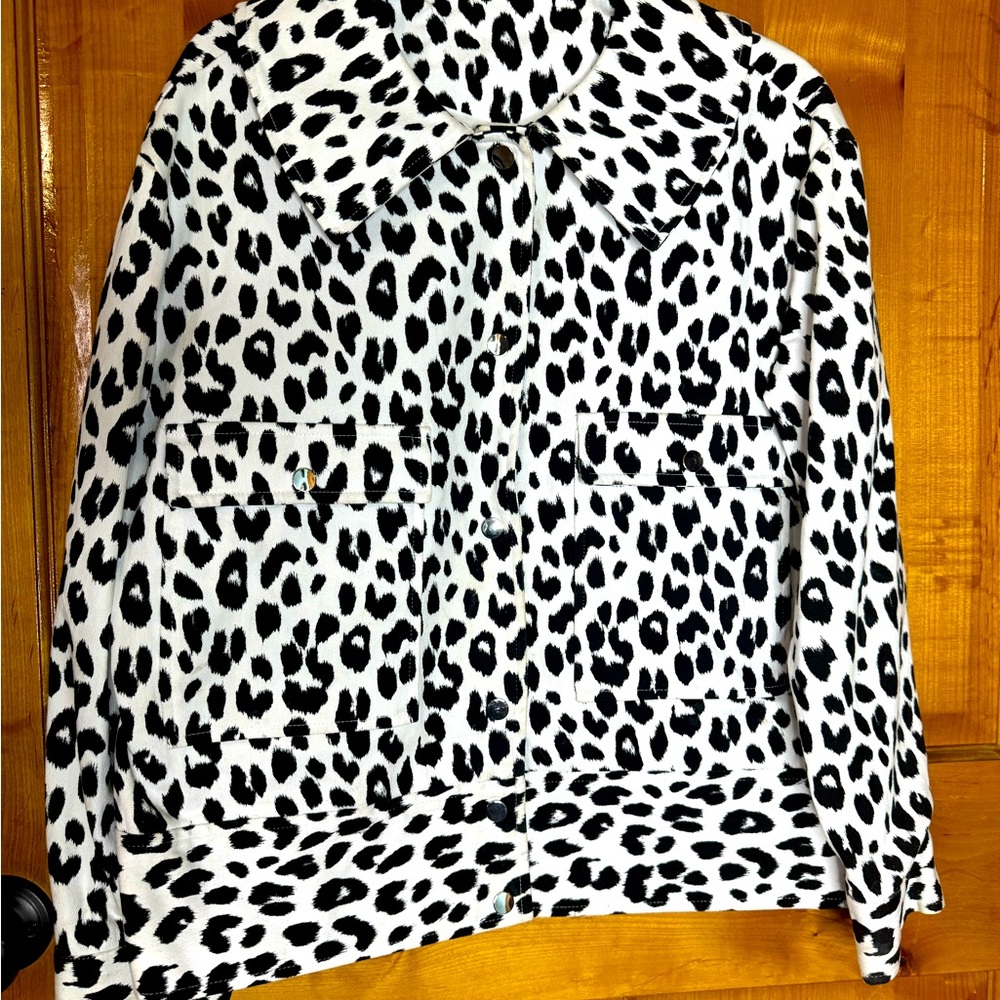 Black and white Jean jacket cheetah. Very nicely made.